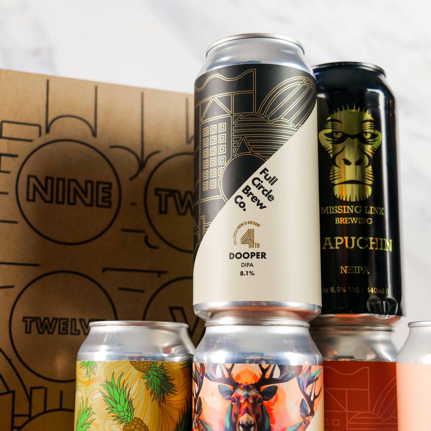 A can of Dooper sat on top of other craft beers you can find inside your Craft Beer Advent Calendar from Full Circle Brew Co. This consists of craft beers from Moonwake, Vault City, Pomona Island & Missing Link.