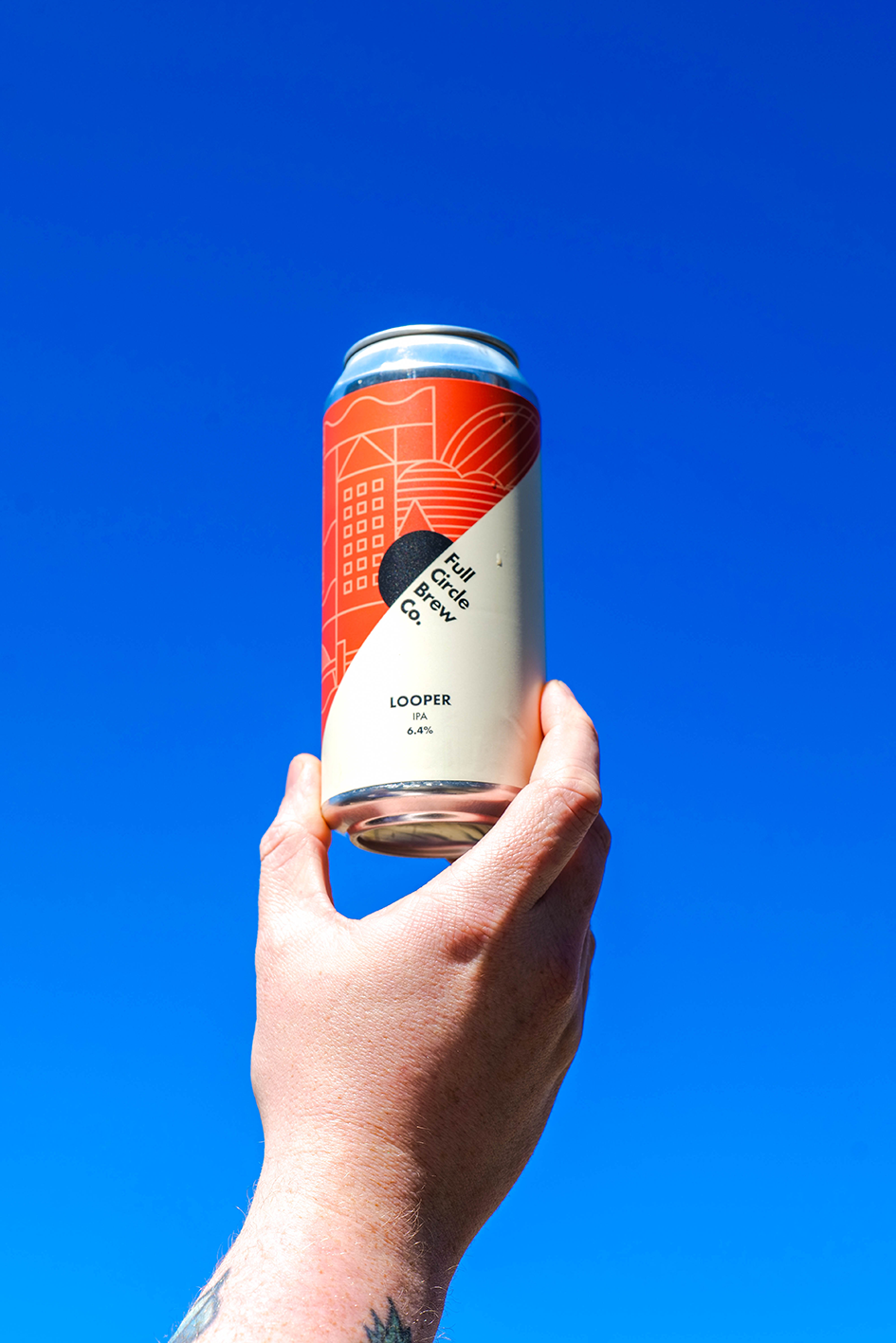 A can of looper being held up